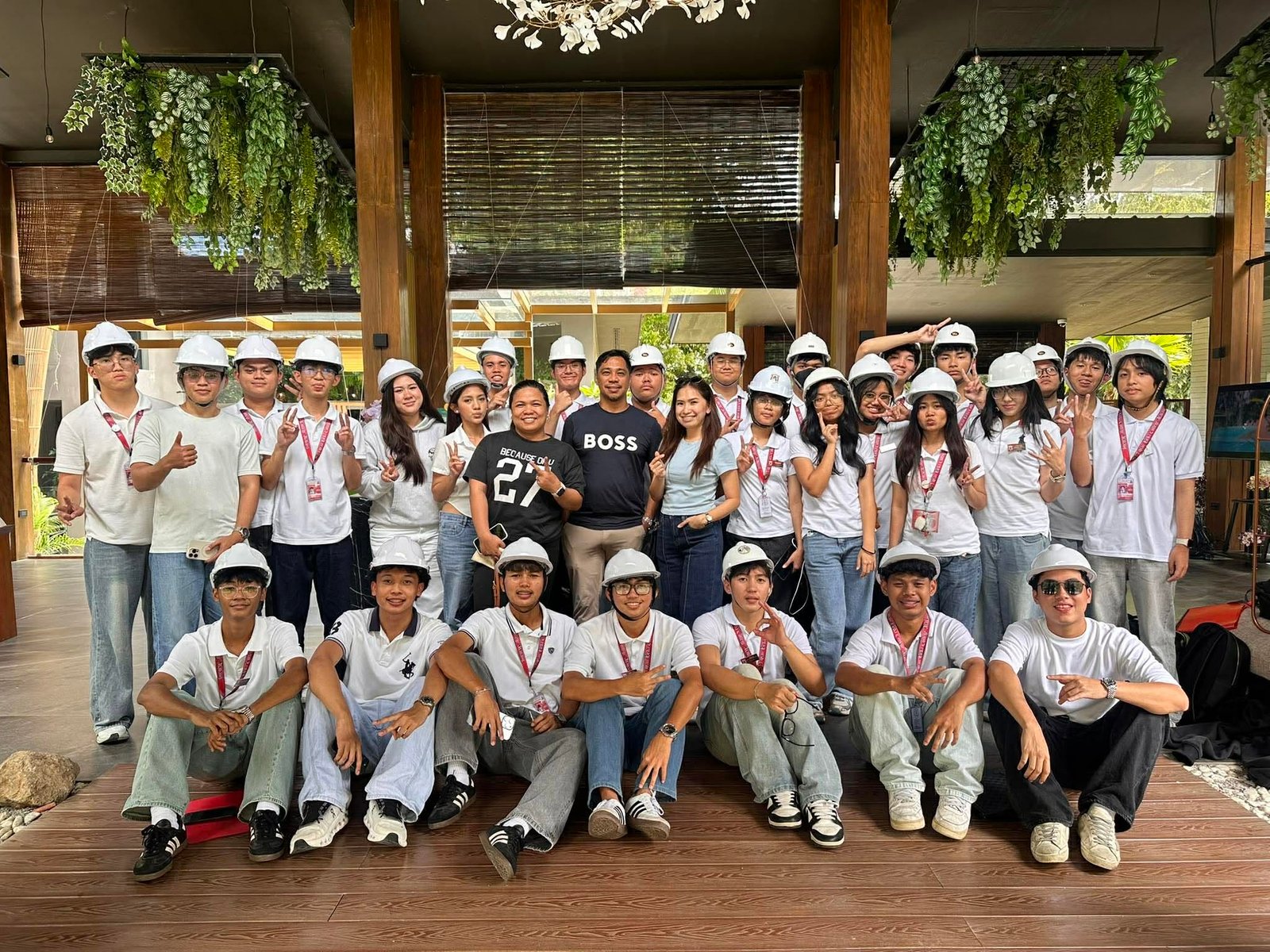 The GT Development Corporation team gathered together in white shirts and hard hats